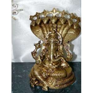   on Seven Hooded Serpent Brass Idol Gold Patina 8