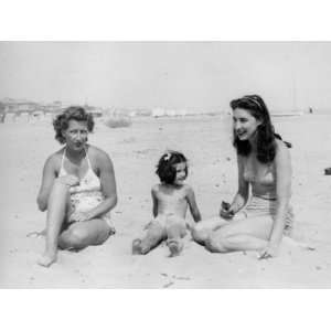 Two Young Women and a Little Girl on a Beach in Italy 