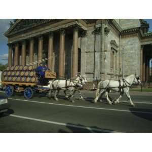 Horses Pull a Cart Load of Beer Kegs Past St. Isaacs Cathedral Premium 