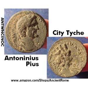   Emperor Antoninus Pius. The City Tyche. Imperial Greek Bronze Coin