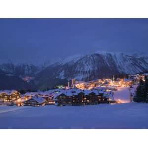  Buildings Lit Up at Dusk, Courchevel, French Alps, France 