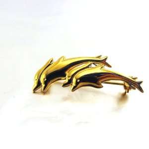  Brooch plated gold Dauphins golden. Jewelry