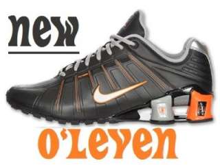 NIKE SHOX OLEVEN MENs Running Shoes BLK /ORANGE/SILVER BRAND NEW 