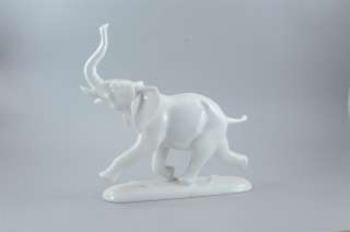 Porcelain Elephant with Raised Trunk Figurine Statue   marked 