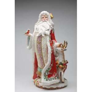   Santa Petting Deer and Holding Bird in Hand Figurine: Home & Kitchen