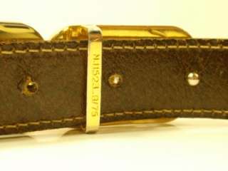 This is a Gucci pivoting buckle belt which makes it reversible. It has 