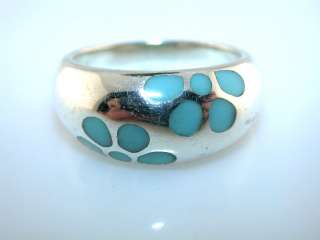 VERY PRETTY CONTEMPORARY STERLING SILVER RING INLAID WITH TURQUOISE.