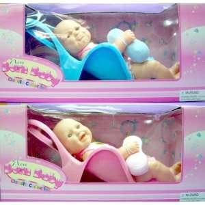   16 New Born Baby Doll in Plastic Baby Seat  2 Asst: Toys & Games